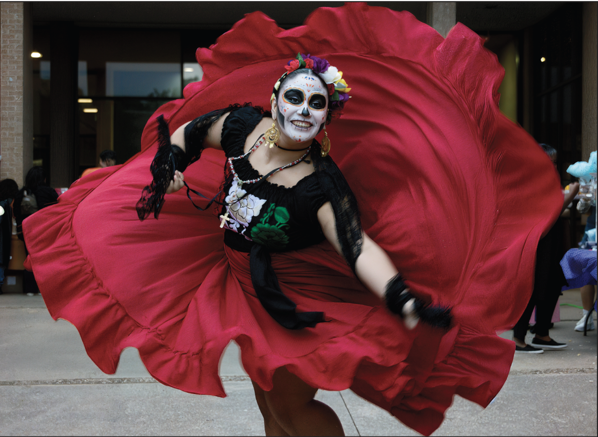 NE Campus student and dance club member Emily Reyes performs a self-made ballet folklorico routine during Fall Fest. She has been dancing since she was three.